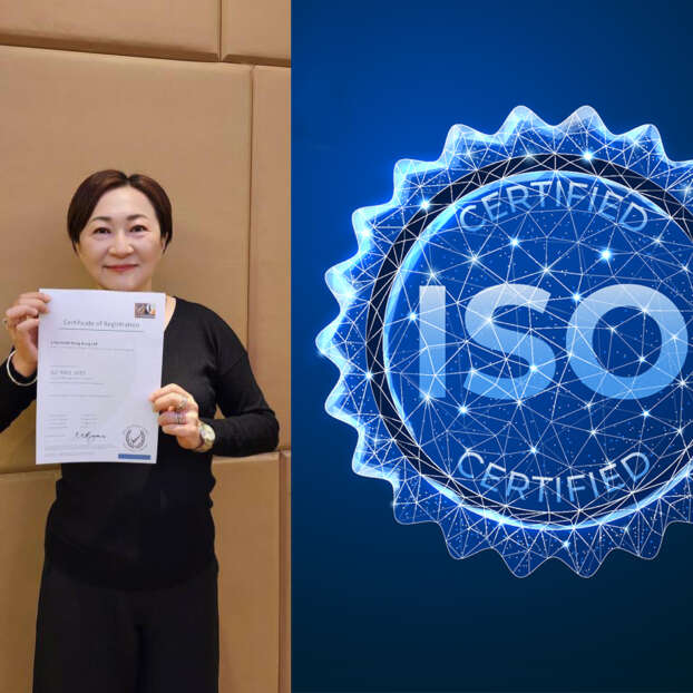 Employee holding iso certificate